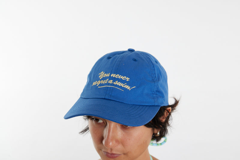 'You Never Regret a Swim' Cap - Blue